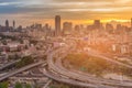 Highway intersection with office building city downtown with sunset sky Royalty Free Stock Photo