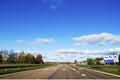 Highway landscape in Europe, street and sings on the road.Blue sky and daylight