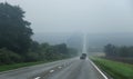 Highway landscape with moving cars at daytime Royalty Free Stock Photo