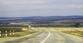 Highway landscape with moving cars at daytime Royalty Free Stock Photo