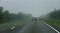 Highway landscape with moving cars at daytime Royalty Free Stock Photo