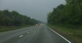 Highway landscape with moving cars at daytime Royalty Free Stock Photo