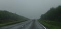 Highway landscape with moving cars at daytime Royalty Free Stock Photo