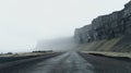 Mystical Cliff Road In Iceland: A Captivating Black And White Photograph Royalty Free Stock Photo