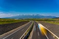 Highway leading to rocky peaks of High Tatras mountains.