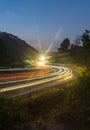 Highway light trails of vehicles lights during rush hour and sunset