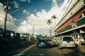 Highway through a lush tropical forest in kauai, hawaii - may 2023 Royalty Free Stock Photo