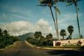 Highway through a lush tropical forest in kauai, hawaii - may 2023 Royalty Free Stock Photo