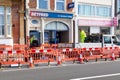 09/02/2020 Portsmouth, Hampshire, UK Highway maintenance workers digging up a road with traffic barriers around them Royalty Free Stock Photo