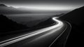 Highway in the mountains. Black and white image. Long exposure Royalty Free Stock Photo
