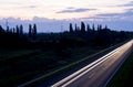 Highway at night showing vehicles lights