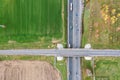 Agricultural fields. road intersection with cars traffic. aerial view