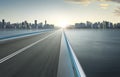 Highway overpass motion blur with city skyline . Royalty Free Stock Photo