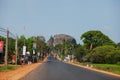 Highway, palm trees and mountaine on background