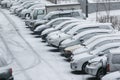 Highway with parked cars during a snowfall Royalty Free Stock Photo