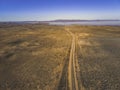 Highway passing through Australian outback desert. Royalty Free Stock Photo