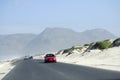 Highway passing sand dunes in South Africa Royalty Free Stock Photo