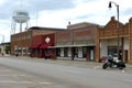 Highway 152 passing through town with The Watertower behind. New Cordell, OK, USA. June 7, 2014.