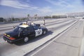 Highway Patrol on earthquake damaged freeway, Los Angeles, California