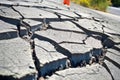 highway pavement buckled and broken from seismic activity