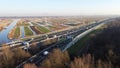 Highway photographed from the air with a drone. Along the Dutch city of Zaandam in the Netherlands with a polder landscape.