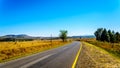 Highway R26 with the fertile farmlands along highway R26, in the Free State province of South Africa