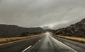 Highway through rainy landscape