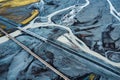 Highway road crossing through glacier river on black sand beach at Iceland Royalty Free Stock Photo