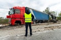 Highway road freight lorry accident. Crashed broken cargo semi trailer truck on freeway roadside and insurance