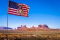Highway Road Highway 163 and Monument Valley with american flag, USA Royalty Free Stock Photo