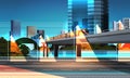 Highway road night city street with modern skyscrapers train on railway monorail crossing bridge urban cityscape Royalty Free Stock Photo