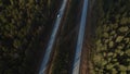 Highway road with traffic cars between green forest Royalty Free Stock Photo