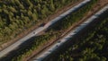 Highway road with traffic cars between green forest Royalty Free Stock Photo