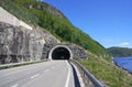 Highway road tunnel. Cars move in a tunnel through a mountain on a freeway. Royalty Free Stock Photo