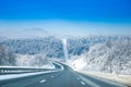 Highway road in winter, mountains covered with snow in Gorski kotar, Croatia