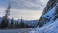 The highway runs along a steep mountain slope.