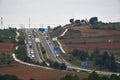 Highway with several lanes where several trucks circulate