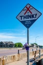 Sioux Falls, South Dakota, USA - 9/2020: Safe driving sign posted at the site of a vehicle fatality to remind drivers to be