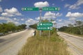 Highway signs of 180 toll road pointing to Merida and Cancun, Yucatan Peninsula