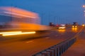 Highway traffic cars at night blured. Cars moving on road on bridge evening blurry. Royalty Free Stock Photo