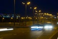 Highway traffic cars at night blured. Cars moving on road on bridge evening blurry. Royalty Free Stock Photo