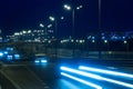 Highway traffic cars at night blured. Cars moving on road on bridge evening blurry. Royalty Free Stock Photo