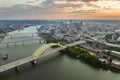 Highway traffic in Cincinnati, Ohio on Daniel Carter Beard Bridge with brightly illuminated high skyscraper buildings in Royalty Free Stock Photo