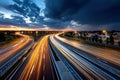 Highway traffic light trails at dusk under stormy sky Royalty Free Stock Photo