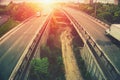 Highway tragic at sunset, big urban city bridges Royalty Free Stock Photo