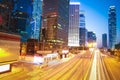 The highway trails light on modern landmark building background