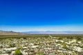 Highway through the vast expanse of the Mojave Desert, California Royalty Free Stock Photo