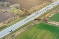 Highway view from above with passing cars, truck driving on the highway Royalty Free Stock Photo
