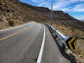 Highway view with galvanized steel guardrails with spiral-shaped ends Royalty Free Stock Photo