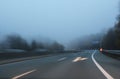 Higway with fog and poor visibility. Motin blur effect Royalty Free Stock Photo